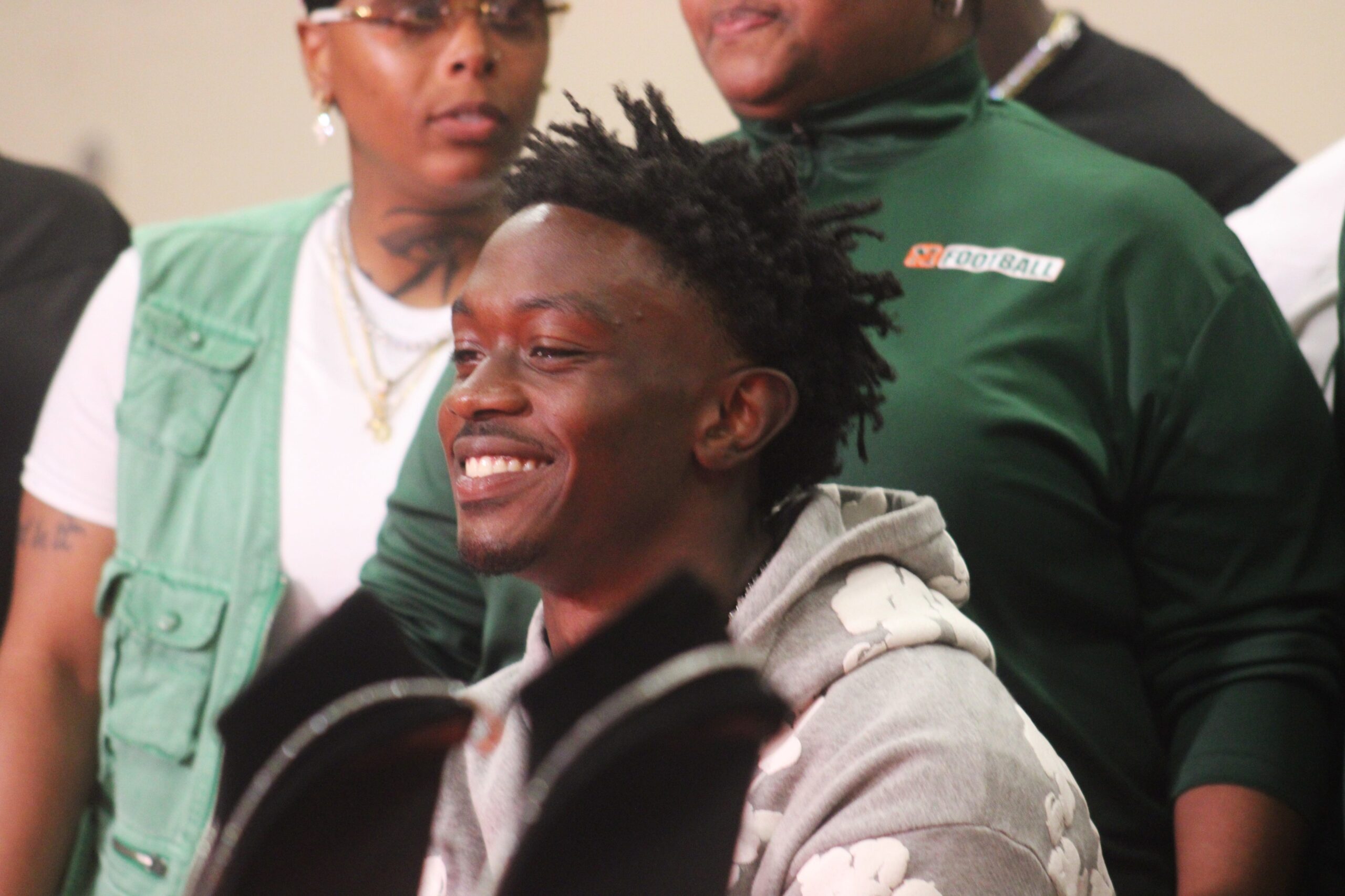 Mandarin wide receiver Jaime Ffrench Jr. smiles before announcing his college commitment at a pep rally before a high school football game against Atlantic Coast on August 30, 2024. Clayton Freeman/Florida Times-Union