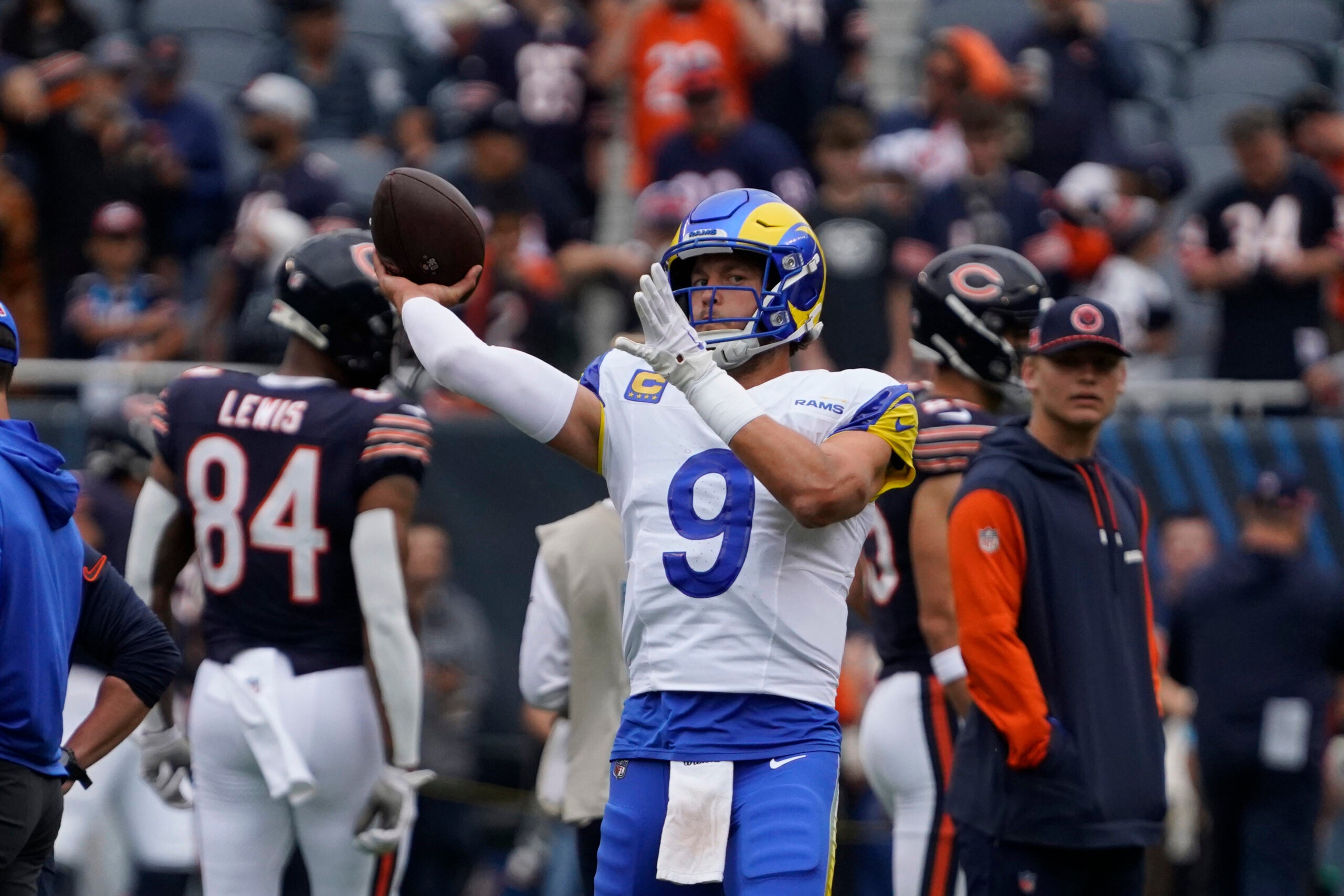 Sep 29, 2024; Chicago, Illinois, USA; Los Angeles Rams quarterback Matthew Stafford (9) warms up before the game against the Chicago Bears at Soldier Field.