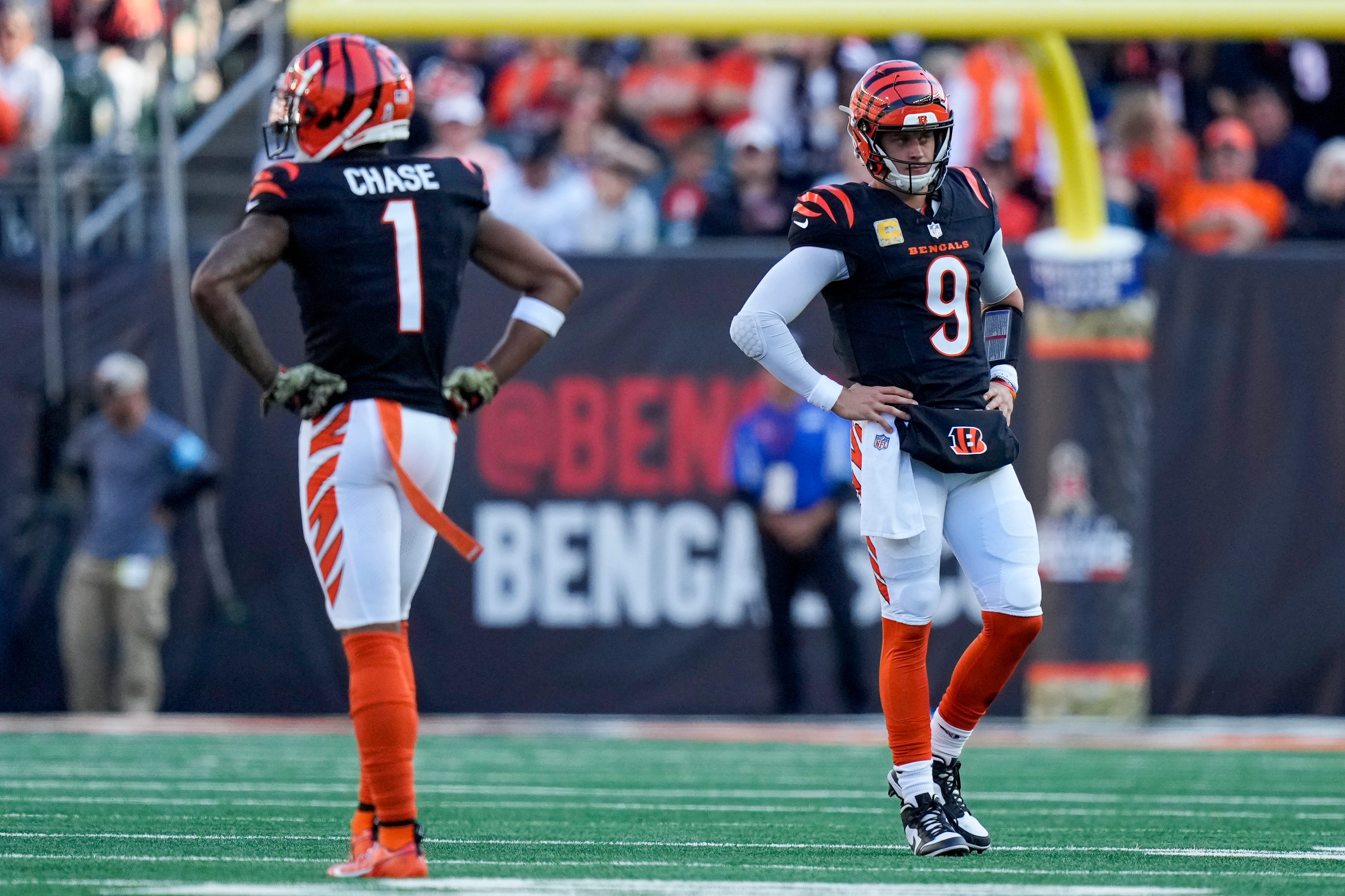 Cincinnati Bengals quarterback Joe Burrow (9) and wide receiver Ja'Marr Chase (1) paces between plays in the second quarter of the NFL Week 9 game between the Cincinnati Bengals and the Las Vegas Raiders at Paycor Stadium in downtown Cincinnati on Sunday, Nov. 3, 2024.