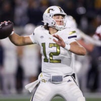 Nov 21, 2024; Atlanta, Georgia, USA; Georgia Tech Yellow Jackets quarterback Aaron Philo (12) throws a pass against the North Carolina State Wolfpack in the fourth quarter at Bobby Dodd Stadium at Hyundai Field.