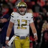 Georgia Tech quarterback Aaron Philo (12) warms up before the start of a NCAA college football game against Georgia in Athens, Ga., on Friday, Nov. 29, 2024. Philo played his high school football in the Athens area winning a state championship at Prince Avenue Christian.