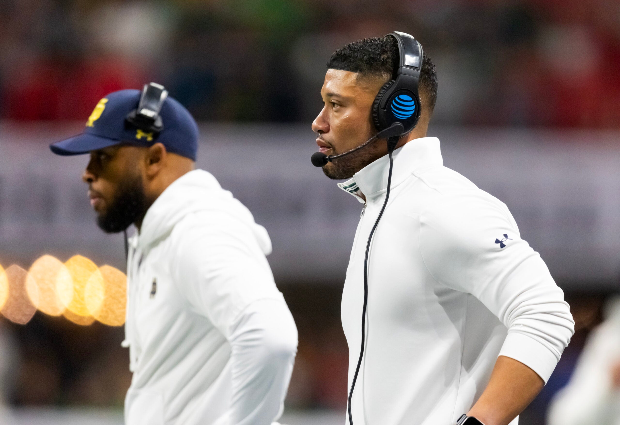 Jan 20, 2025; Atlanta, GA, USA; Notre Dame Fighting Irish head coach Marcus Freeman (right) with wide receivers coach Mike Brown against the Ohio State Buckeyes during the CFP National Championship college football game at Mercedes-Benz Stadium. Mandatory Credit: Mark J. Rebilas-Imagn Images
