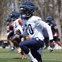 May 9, 2025; Lake Forest, IL, USA; Chicago Bears defensive backs Devin Kirkwood (38) and Zah Frazier (20) warm up during the Rookie Minicamp at Halas Hall.