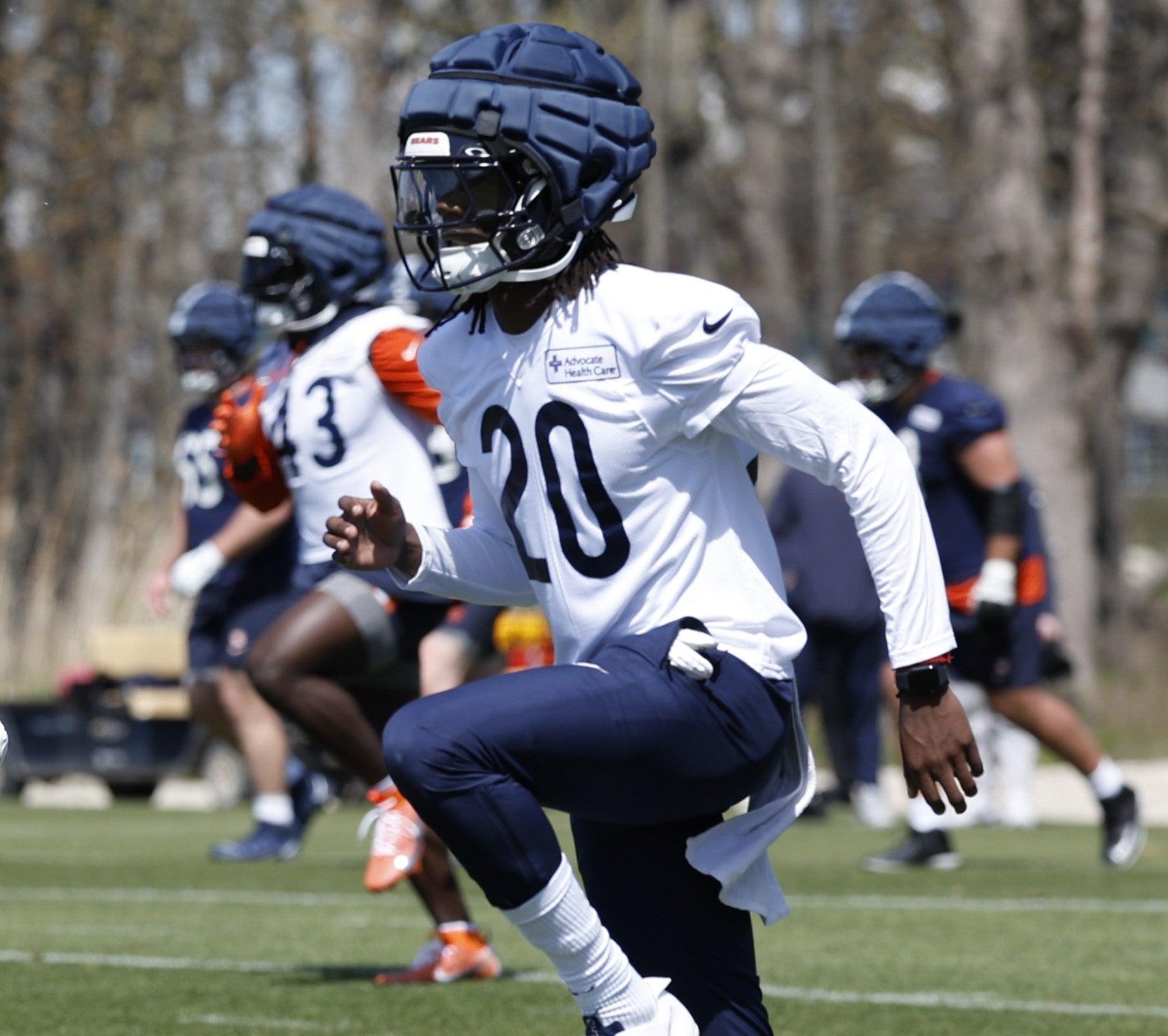 May 9, 2025; Lake Forest, IL, USA; Chicago Bears defensive backs Devin Kirkwood (38) and Zah Frazier (20) warm up during the Rookie Minicamp at Halas Hall.