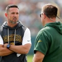 Green Bay Packers Coach Matt LaFleur, left, talks with General Manager Brian Gutekunst during practice on July 25, 2025, at Ray Nitschke Field in Ashwaubenon, Wis.