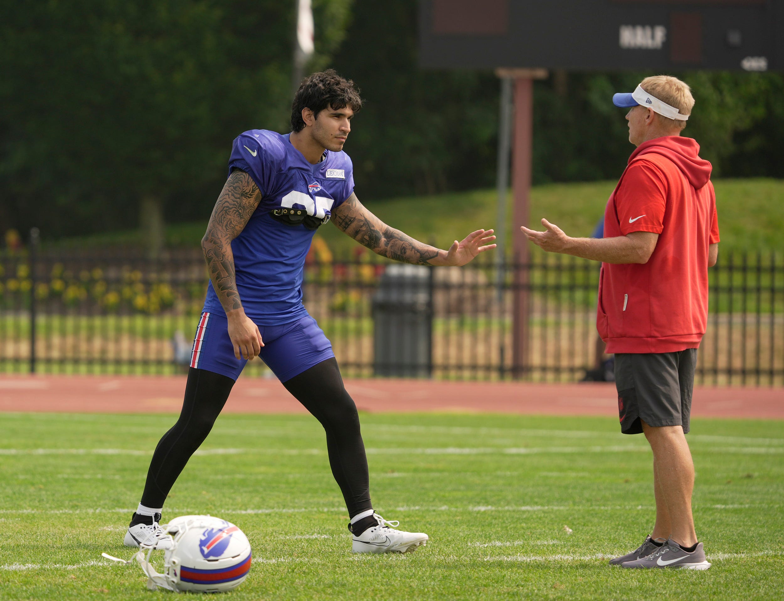 Buffalo Bills linebacker Jimmy Ciarlo stays after practice for advice from special teams coordinator Chris Tabor at Bills Training Camp at St. John Fisher University in Pittsford on Aug.6, 2025.