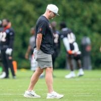 Director of player personnel Duke Tobin walks the field during practice at the Paycor Stadium practice field in downtown Cincinnati on Wednesday, Aug. 20, 2025.