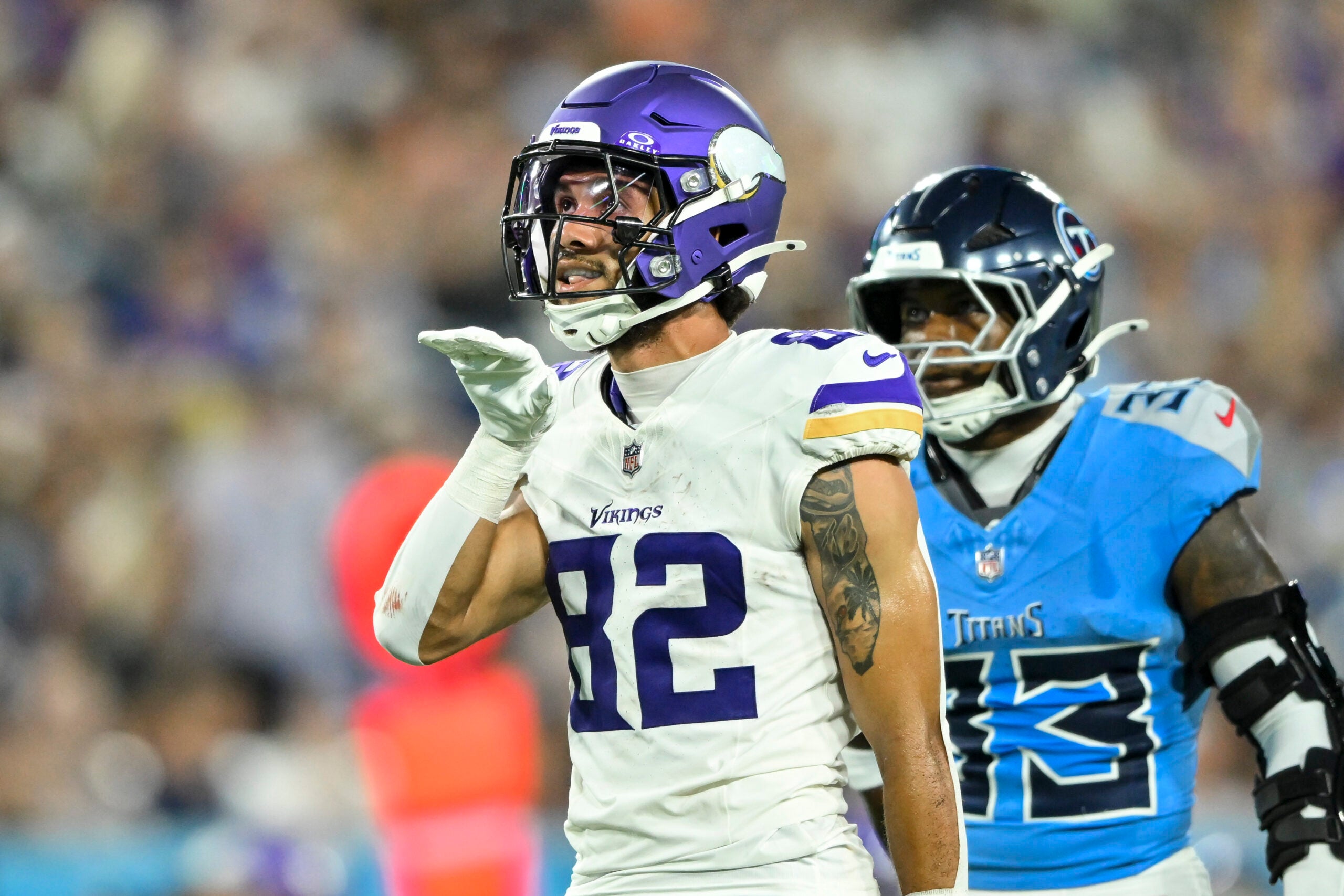 Aug 22, 2025; Nashville, Tennessee, USA; Minnesota Vikings wide receiver Jeshaun Jones (82) celebrates his first down catch against the Tennessee Titan during the first half at Nissan Stadium.