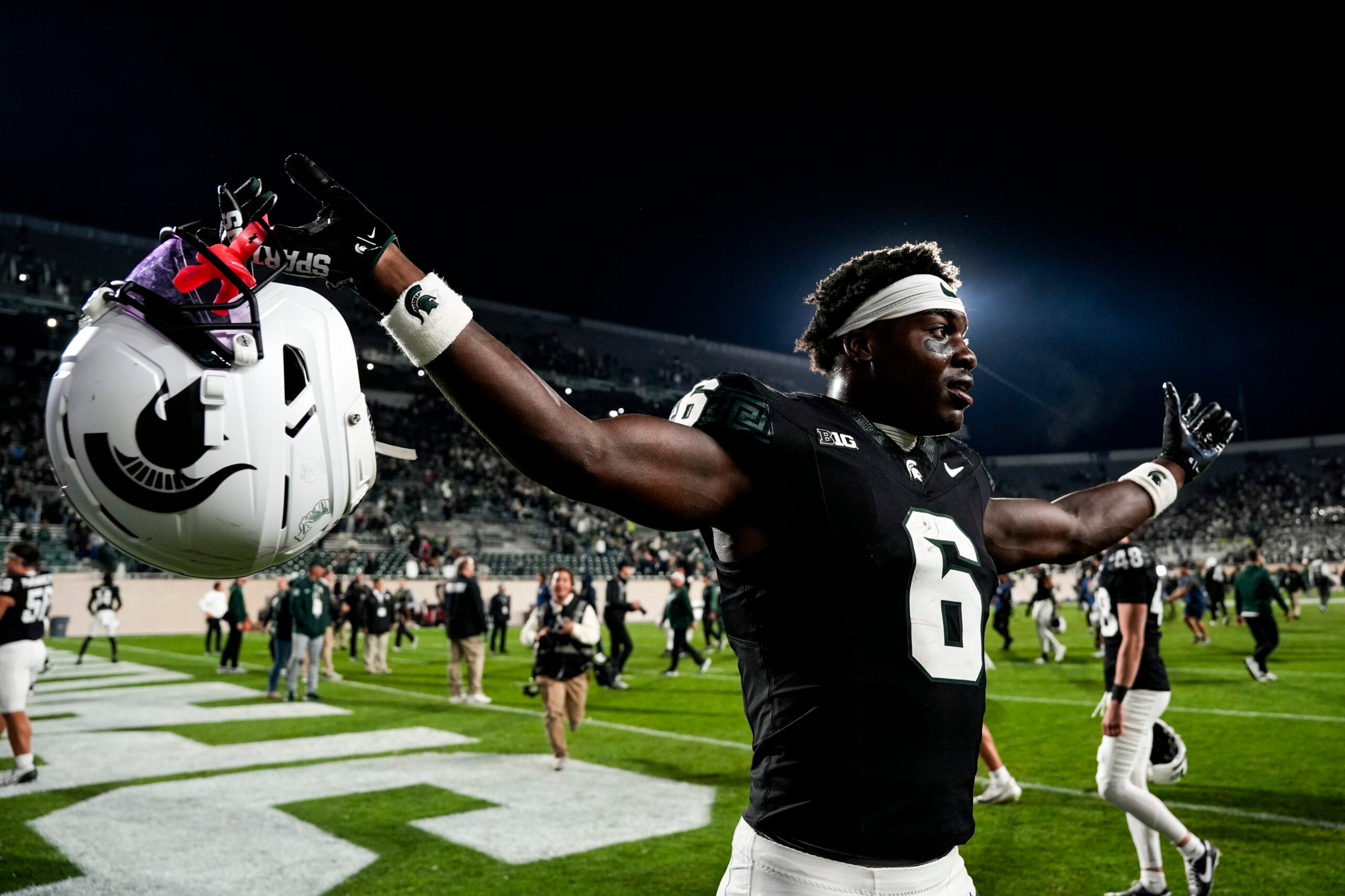 Sep 6, 2025; East Lansing, Michigan, USA; Michigan State wide receiver Nick Marsh (6) celebrates a double-overtime victory over Boston College at Spartan Stadium. Mandatory Credit: Brendan Mullin-Imagn Images