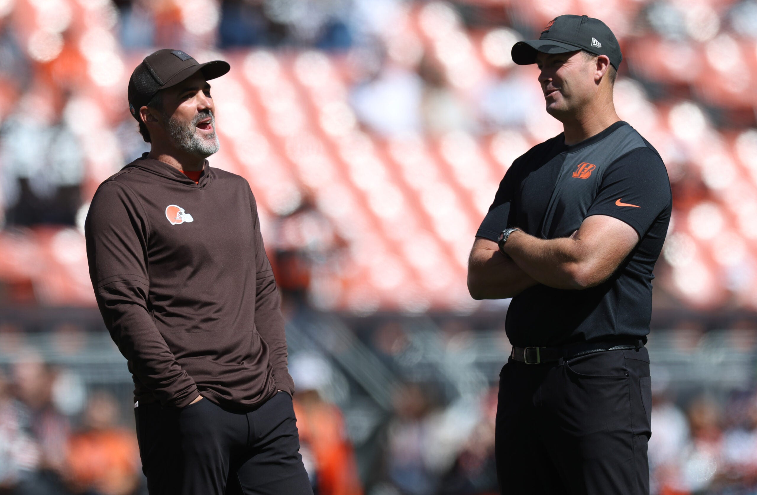 Sep 7, 2025; Cleveland, Ohio, USA; Cleveland Browns head coach Kevin Stefanski (left) and Cincinnati Bengals head coach Zac Taylor before a game at Huntington Bank Field.