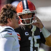 Cincinnati Bengals defensive end Trey Hendrickson (91) and Cleveland Browns quarterback Joe Flacco (15) talk after the fourth quarter of the NFL Week 1 game between the Cleveland Browns and the Cincinnati Bengals at Huntington Bank Field in Cleveland on Sunday, Sept. 7, 2025.
