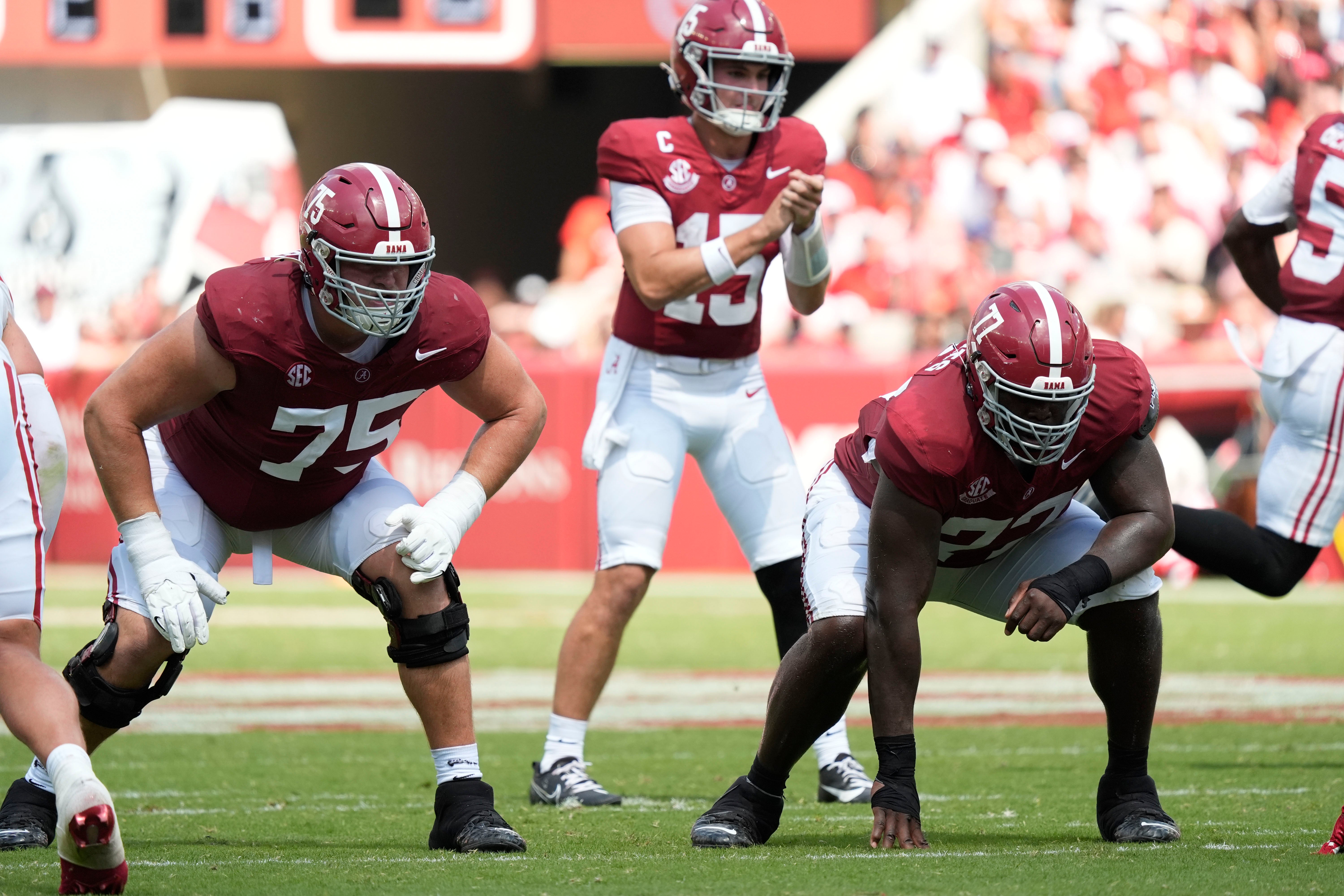 Sep 13, 2025; Tuscaloosa, Alabama, USA; Alabama offensive lineman Wilkin Formby (75) and Alabama offensive lineman Jaeden Roberts (77) line up to block as Alabama quarterback Ty Simpson (15) calls the snap count at Saban Field at Bryant-Denny Stadium.