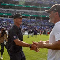 Sep 14, 2025; Baltimore, Maryland, USA; Cleveland Browns head coahc Kevin Stefanski and Baltimore Ravens head coach John Harbaugh shake hands after the game at M&T Bank Stadium.