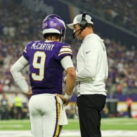 Sep 14, 2025; Minneapolis, Minnesota, USA; Minnesota Vikings quarterback J.J. McCarthy (9) speaks with Minnesota Vikings head coach Kevin O'Connell during the first half against the Atlanta Falcons at U.S. Bank Stadium.