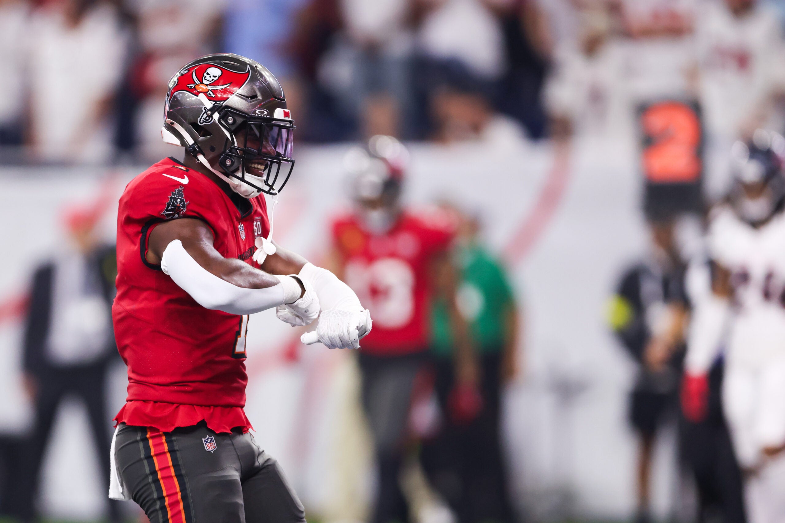 Sep 15, 2025; Houston, Texas, USA; Tampa Bay Buccaneers running back Rachaad White (1) celebrates after scoring a touchdown during the fourth quarter against the Houston Texans at NRG Stadium.