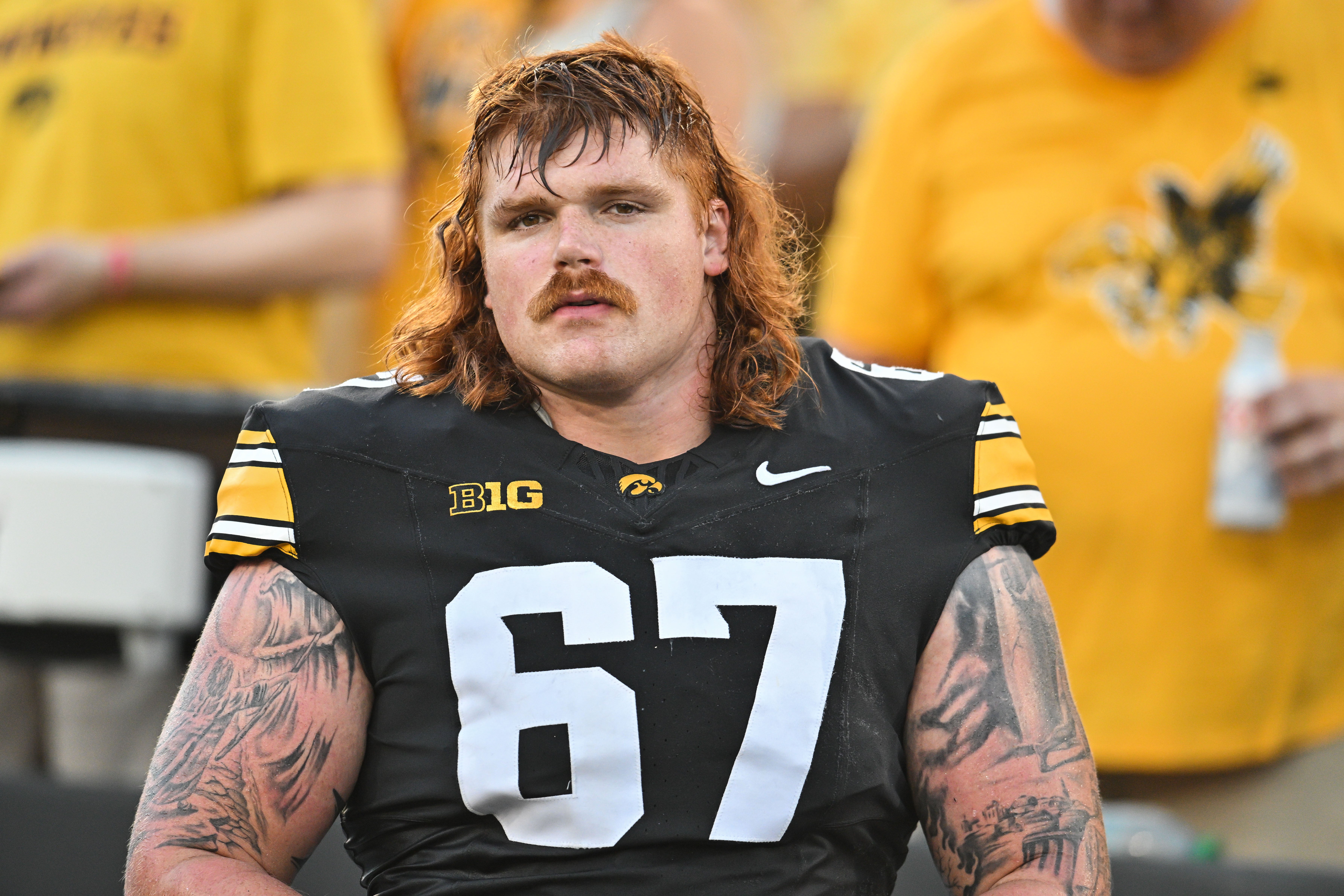 Sep 13, 2025; Iowa City, Iowa, USA; Iowa Hawkeyes offensive lineman Gennings Dunker (67) looks on before the game against the Massachusetts Minutemen at Kinnick Stadium. Mandatory Credit: Jeffrey Becker-Imagn Images