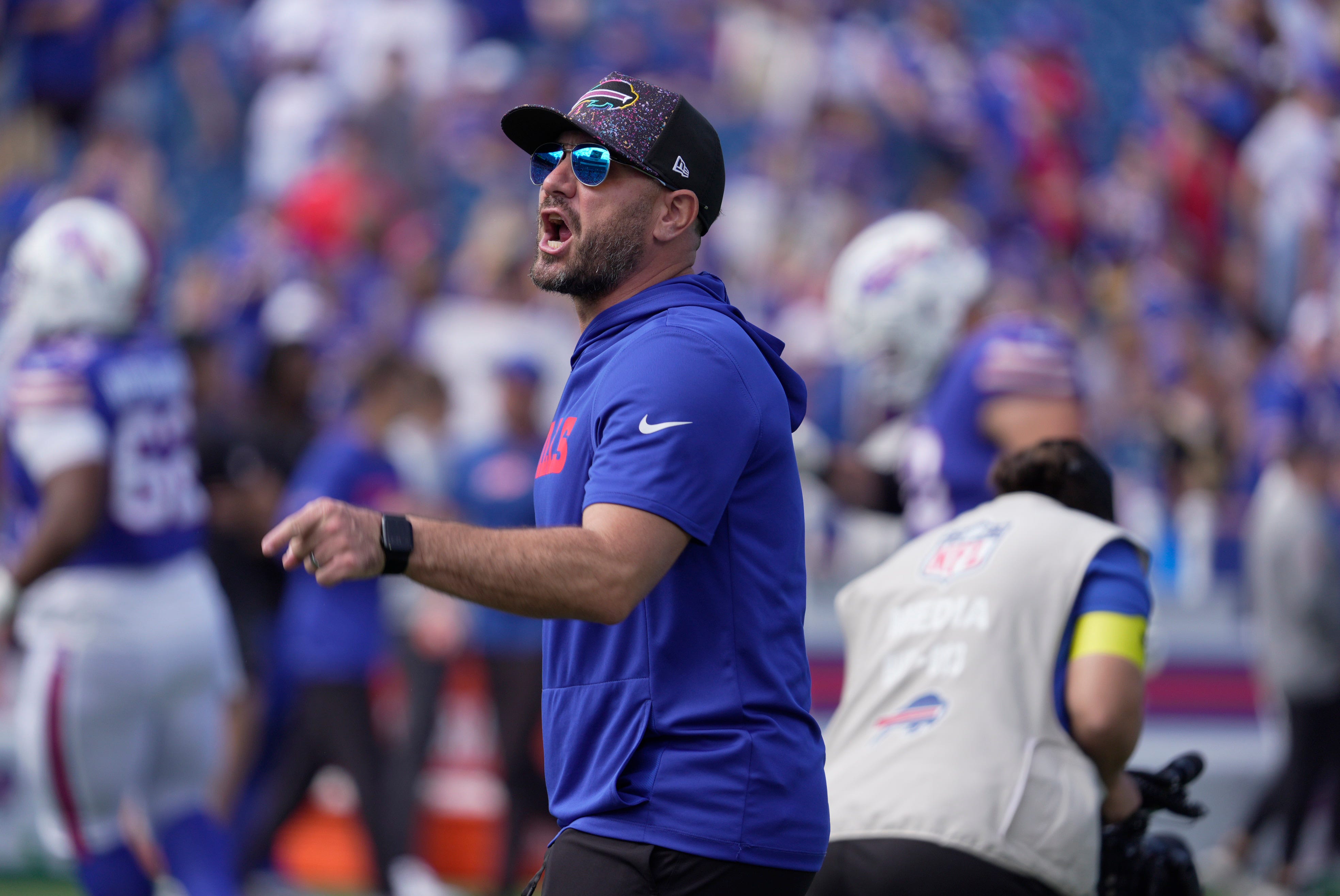 Buffalo Bills defensive coordinator, Bobby Babich yells to the team during warm ups trying to get them pumped up before their home game against the New Orleans Saints in Orchard Park on Sept. 28, 2025.