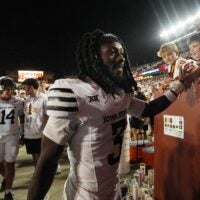 Iowa State Cyclones' defensive back Jontez Williams (3) celebrates with fans after winning over Arizona in the Big-12 conference showdown on Sept. 27, 2025, at Jack Trice Stadium in Ames, Iowa.