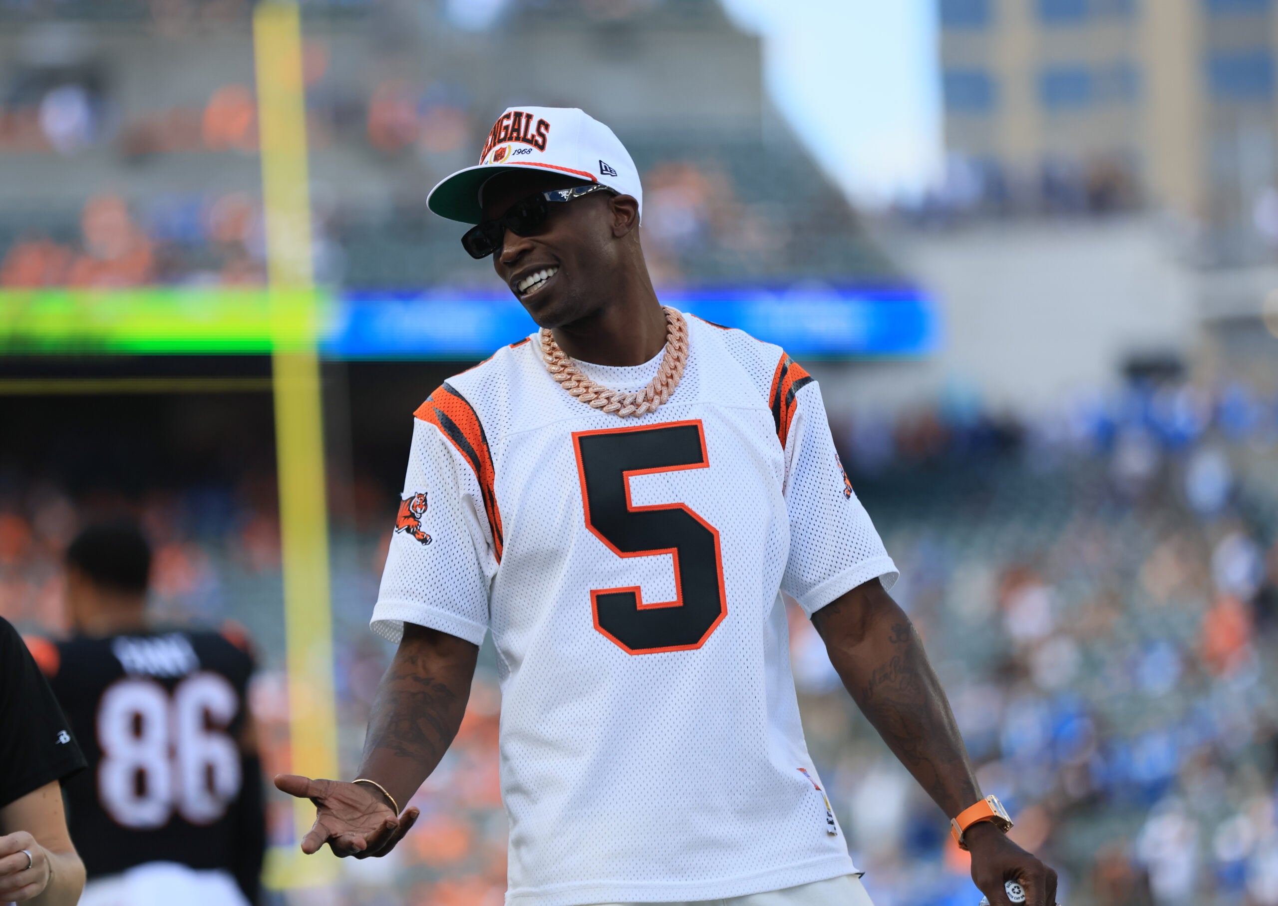 Oct 5, 2025; Cincinnati, Ohio, USA; Former Cincinnati Bengals wide receiver Chad Johnson walks on the field prior to a game against the Detroit Lions at Paycor Stadium.