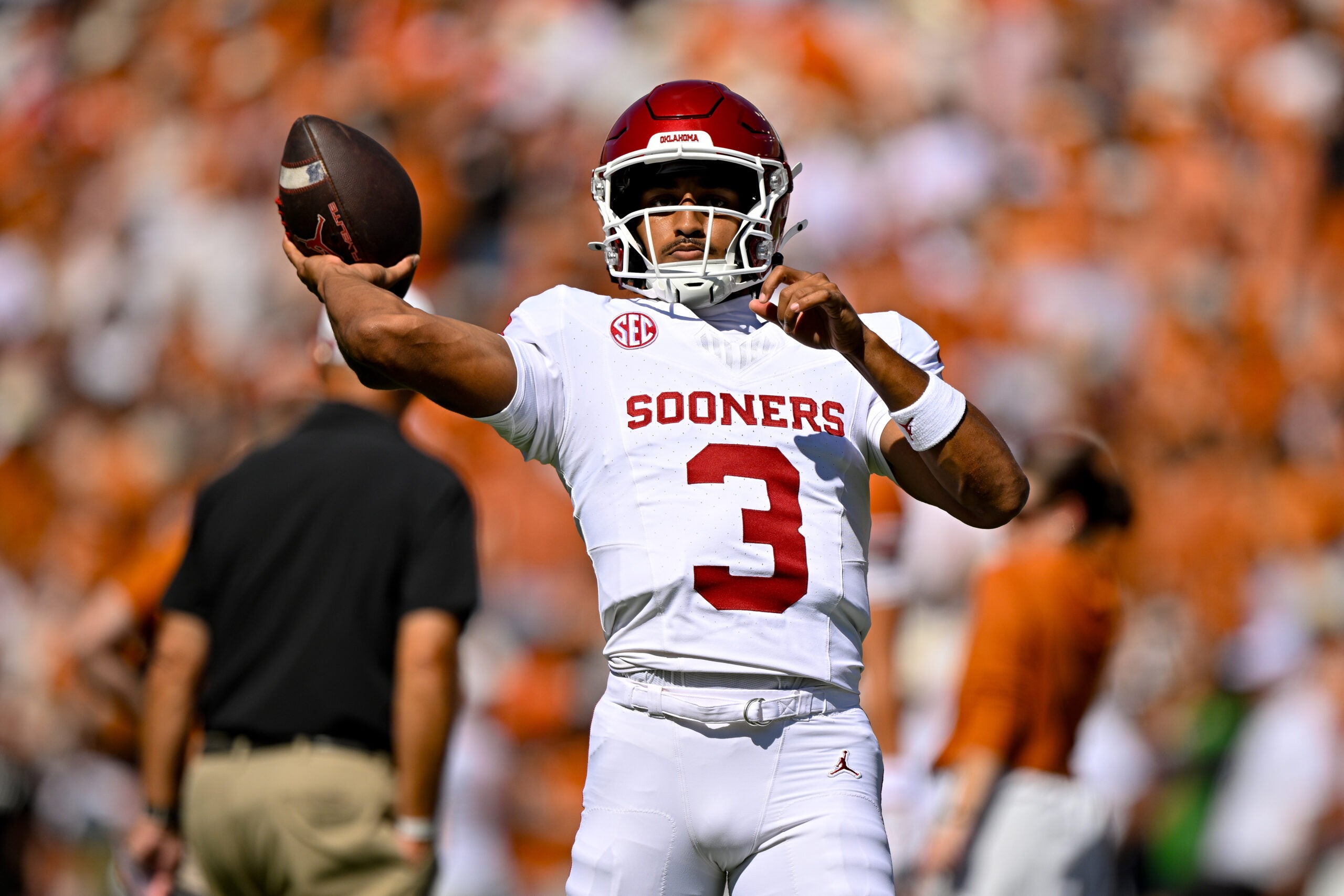 Oct 11, 2025; Dallas, Texas, USA; Oklahoma Sooners quarterback Michael Hawkins Jr. (3) warms up before the game against the Texas Longhorns at Cotton Bowl.