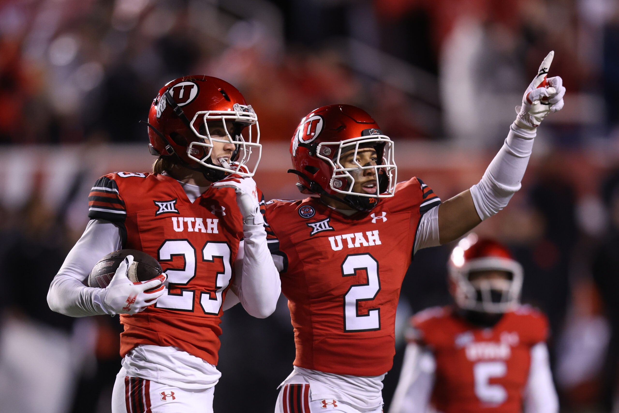 Oct 11, 2025; Salt Lake City, Utah, USA; Utah Utes safety Jackson Bennee (23) and cornerback Smith Snowden (2) react to a play against the Arizona State Sun Devils during the third quarter at Rice-Eccles Stadium. Mandatory Credit: Rob Gray-Imagn Images