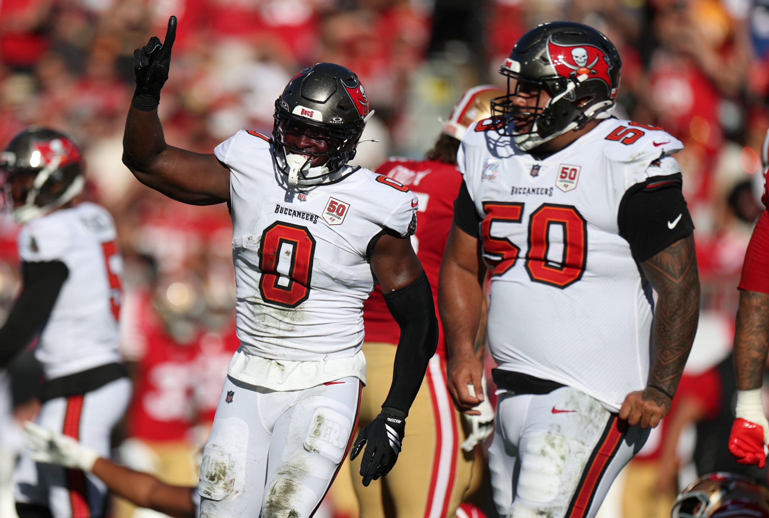 Oct 12, 2025; Tampa, Florida, USA; Tampa Bay Buccaneers linebacker Yaya Diaby (0) and defensive tackle Vita Vea (50) react after a sack during the first quarter against the San Francisco 49ers at Raymond James Stadium.