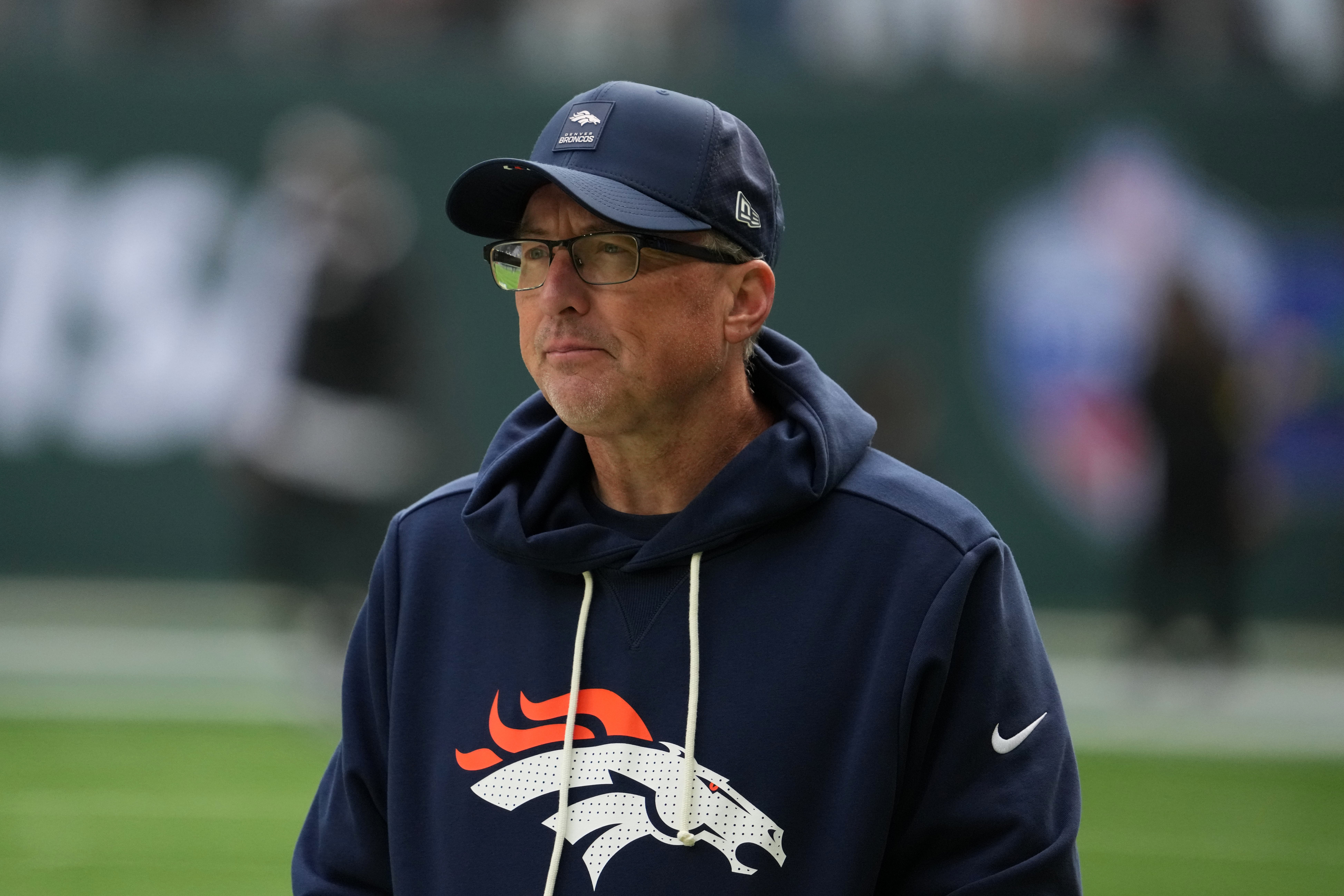 Oct 12, 2025; Tottenham, United Kingdom; Denver Broncos senior offensive assistant coach Pete Carmichael watches during an NFL International Series game against the New York Jets at Tottenham Hotspur Stadium.