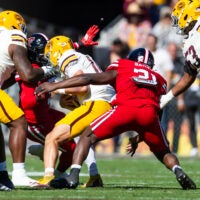 Oct 18, 2025; Tempe, Arizona, USA; Texas Tech Red Raiders linebacker David Bailey (31) sacks Arizona State Sun Devils quarterback Sam Leavitt (10) in the first half at Mountain America Stadium.