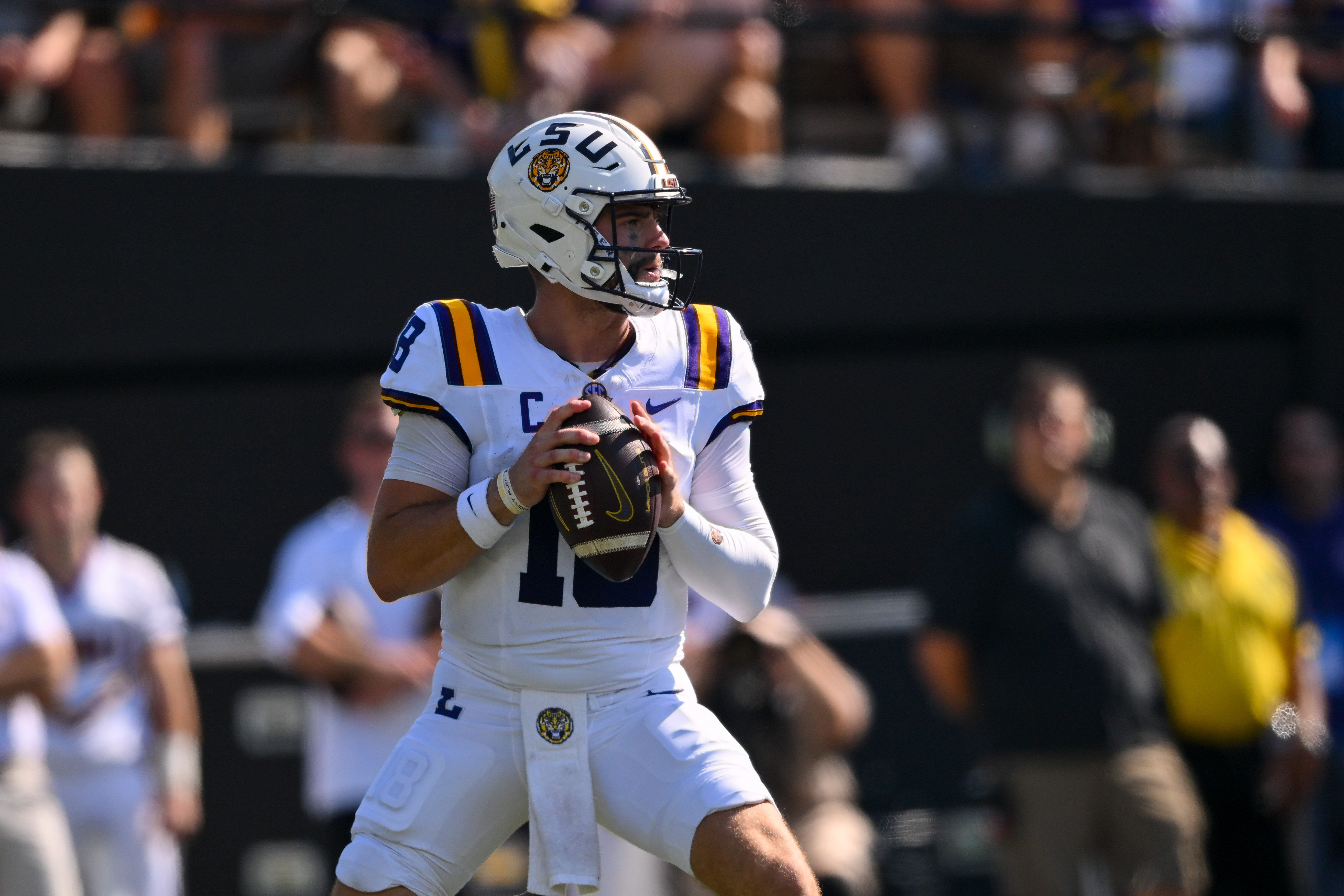 Oct 18, 2025; Nashville, Tennessee, USA; Louisiana State Tigers quarterback Garrett Nussmeier (18) stands in the pocket against the Vanderbilt Commodores during the second half at FirstBank Stadium.
