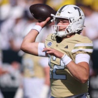 Oct 25, 2025; Atlanta, Georgia, USA; Georgia Tech Yellow Jackets quarterback Aaron Philo (12) warms up before a game against the Syracuse Orange at Bobby Dodd Stadium at Hyundai Field.