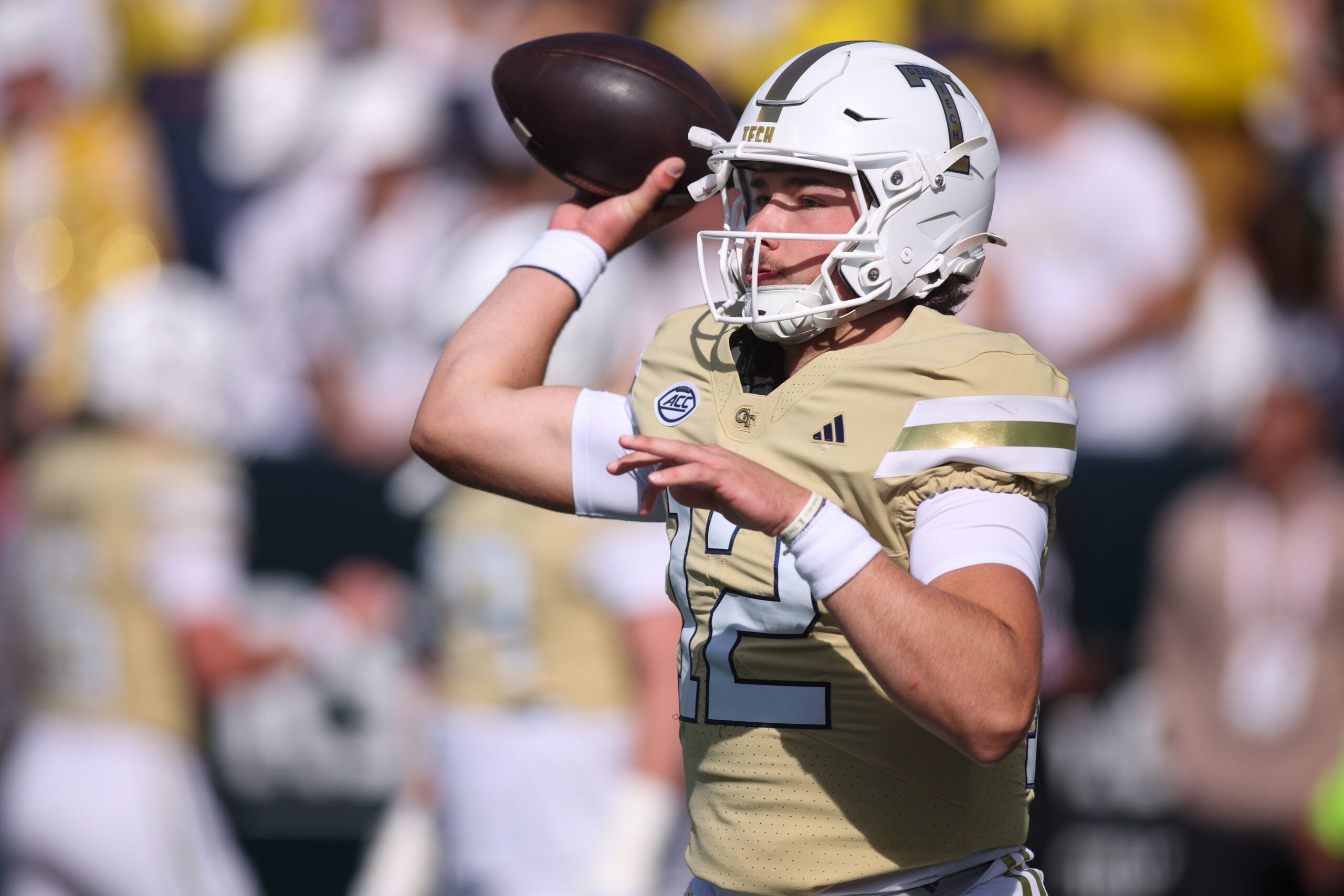 Oct 25, 2025; Atlanta, Georgia, USA; Georgia Tech Yellow Jackets quarterback Aaron Philo (12) warms up before a game against the Syracuse Orange at Bobby Dodd Stadium at Hyundai Field.