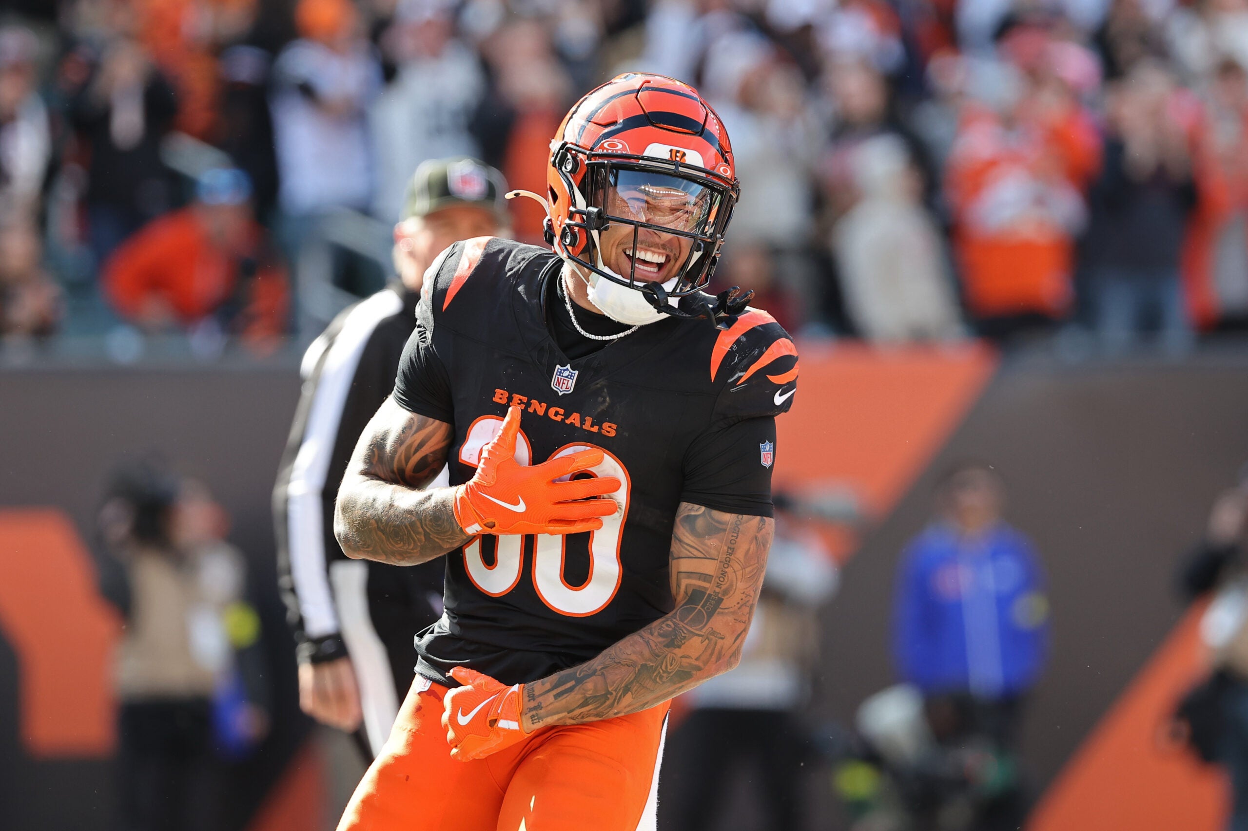 Oct 26, 2025; Cincinnati, Ohio, USA; Cincinnati Bengals running back Chase Brown (30) celebrates scoring a touchdown during the second quarter against the New York Jets at Paycor Stadium.