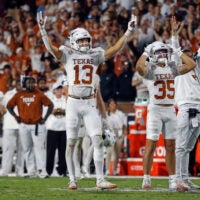 Oct 25, 2025; Starkville, Mississippi, USA; Texas Longhorns wide receiver Parker Livingstone (13) and Texas Longhorns wide receiver Rett Andersen (35) react during overtime against the Mississippi State Bulldogs at Davis Wade Stadium at Scott Field.