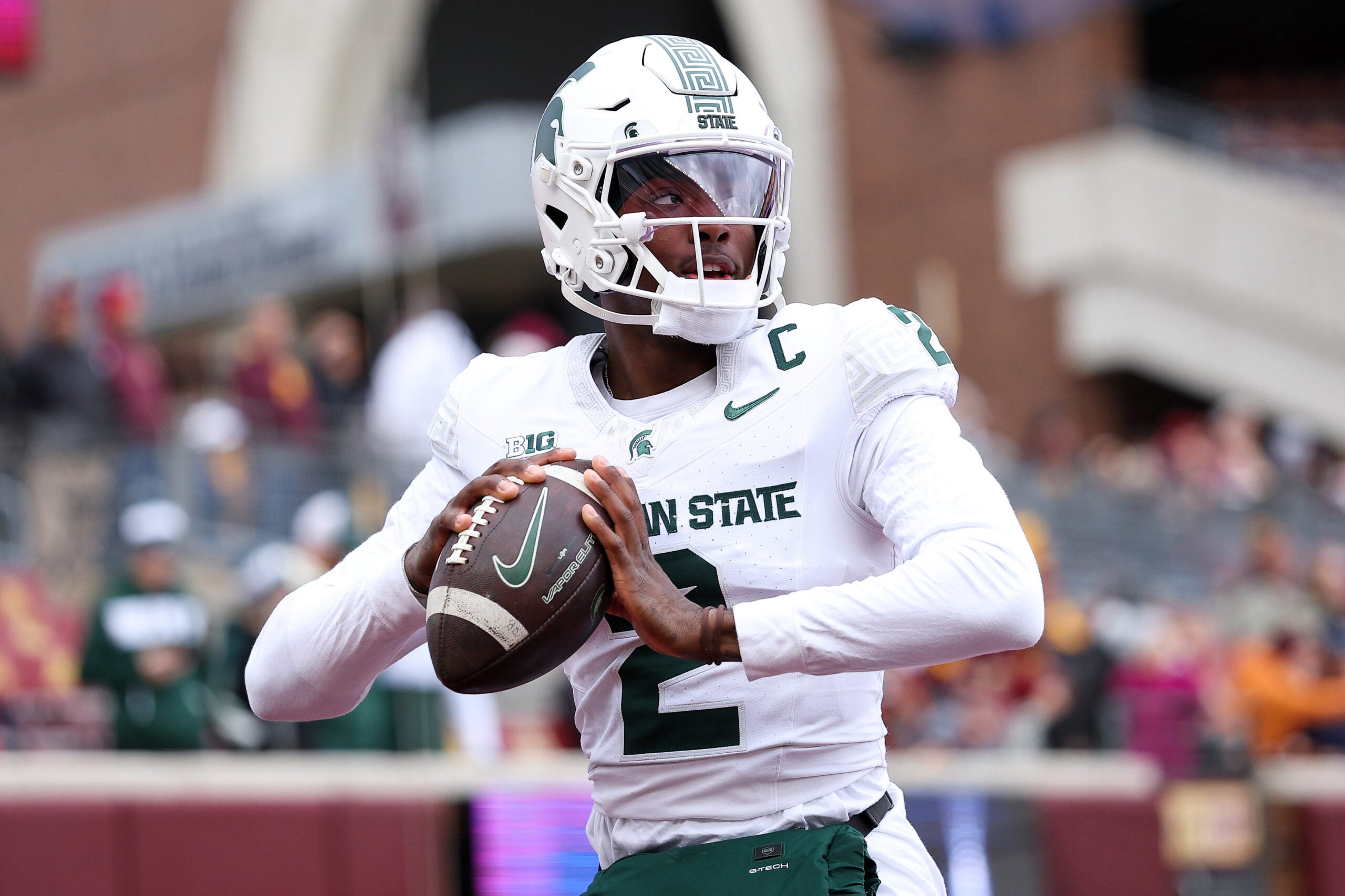 Nov 1, 2025; Minneapolis, Minnesota, USA; Michigan State Spartans quarterback Aidan Chiles (2) warms up before the game against the Minnesota Golden Gophers at Huntington Bank Stadium. Mandatory Credit: Matt Krohn-Imagn Images