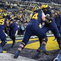 Michigan offensive lineman Ty Haywood (79) warms up with offensive lineman Avery Gach (74) ahead of the Purdue game at Michigan Stadium in Ann Arbor on Saturday, November 1, 2025.
