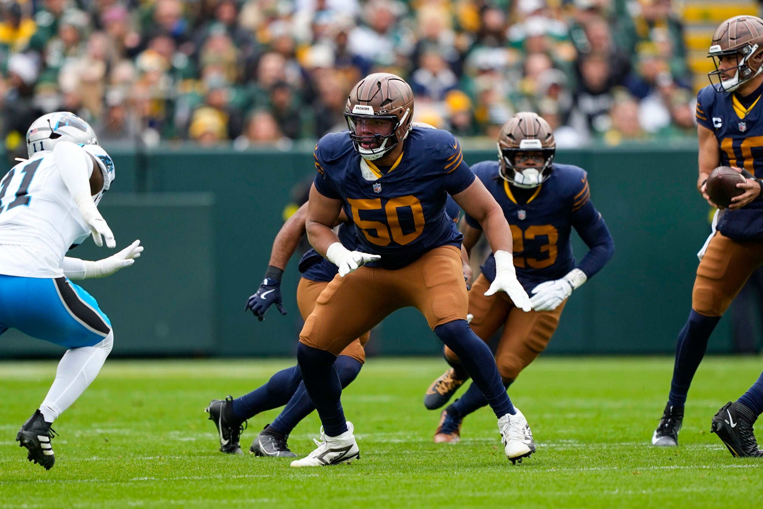 Nov 2, 2025; Green Bay, Wisconsin, USA; Green Bay Packers offensive linenam Zach Tom (50) during the game against the Carolina Panthers at Lambeau Field.