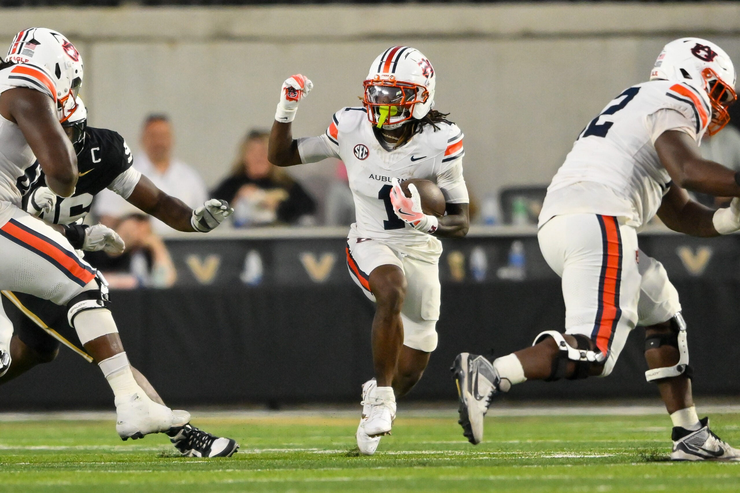Nov 8, 2025; Nashville, Tennessee, USA; Auburn Tigers wide receiver Eric Singleton Jr. (1) runs with the ball after a made catch against the Vanderbilt Commodores during the first half at FirstBank Stadium.