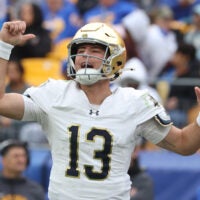 Nov 15, 2025; Pittsburgh, Pennsylvania, USA; Notre Dame Fighting Irish quarterback CJ Carr (13) calls an audible at the line of scrimmage against the Pittsburgh Panthers during the fourth quarter at Acrisure Stadium. Mandatory Credit: Charles LeClaire-Imagn Images