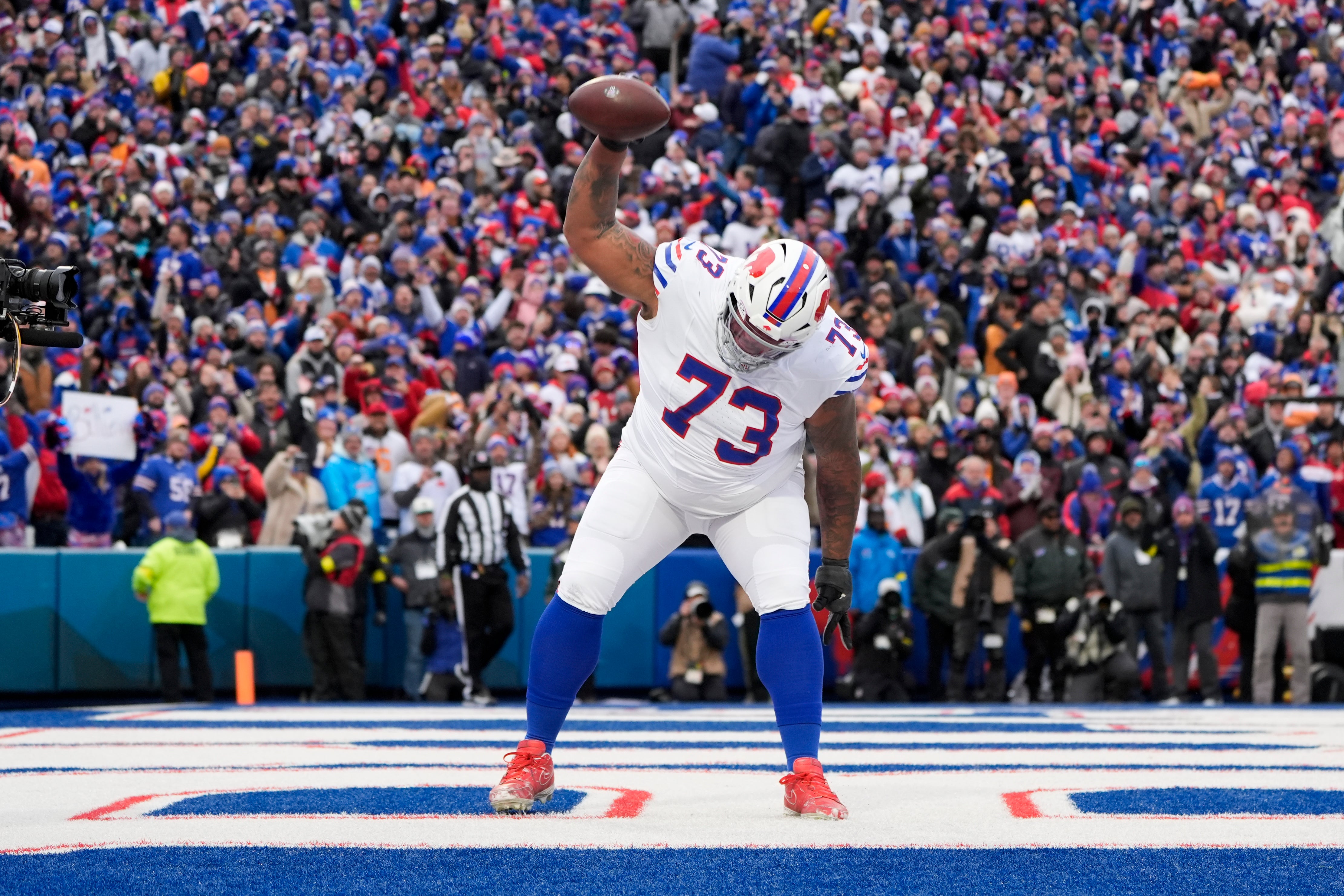 Nov 16, 2025; Orchard Park, New York, USA; Buffalo Bills offensive tackle Dion Dawkins (73) celebrates Josh Allen’s first quarter touchdown against the Tampa Bay Buccaneers at Highmark Stadium.