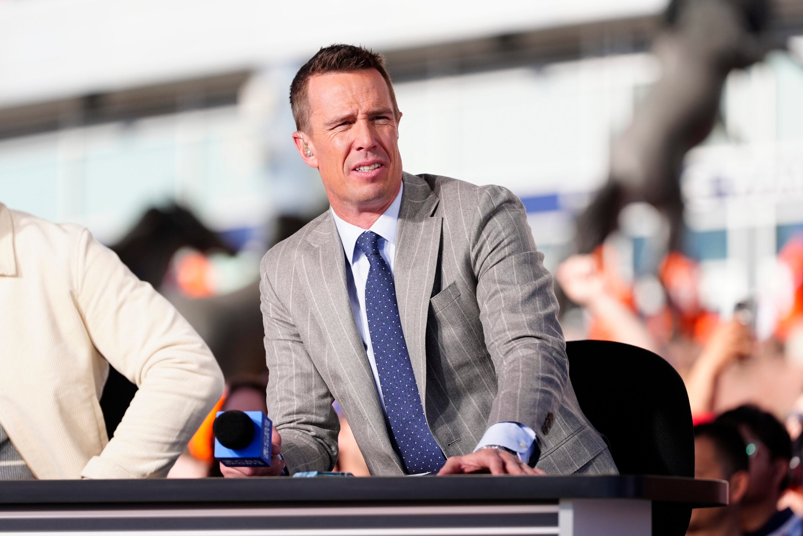Nov 16, 2025; Denver, Colorado, USA; CBS sports broadcaster Matt Ryan before the game between the Kansas City Chiefs against the Denver Broncos at Empower Field at Mile High.