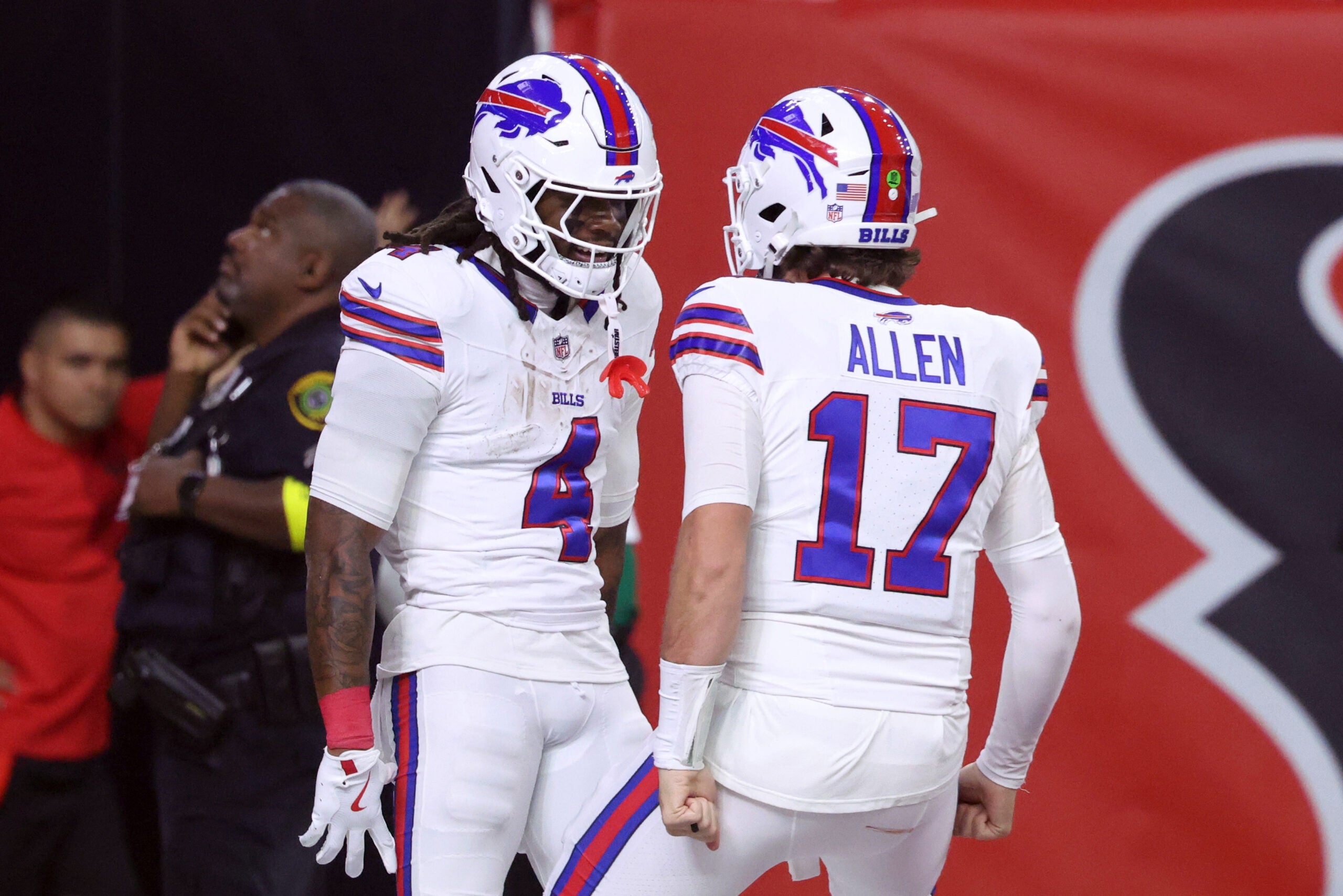 Nov 20, 2025; Houston, Texas, USA; Buffalo Bills running back James Cook III (4) celebrates with quarterback Josh Allen (17) after scoring a touchdown against the Houston Texans in the first quarter at NRG Stadium.