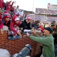 Oklahoma coach Brent Venables celebrates with fans after a college football game between the University of Oklahoma Sooners (OU) and the Missouri Tigers at Gaylord Family Ð Oklahoma Memorial Stadium in Norman, Okla., on Saturday, Nov. 22, 2025. Oklahoma won 17-6.