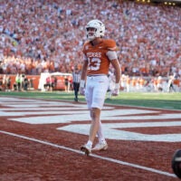 Nov 22, 2025; Austin, Texas, USA; Texas Longhorns wide receiver Parker Livingstone (13) reacts after scoring a touchdown during the first half against the Arkansas Razorbacks at Darrell K Royal-Texas Memorial Stadium.