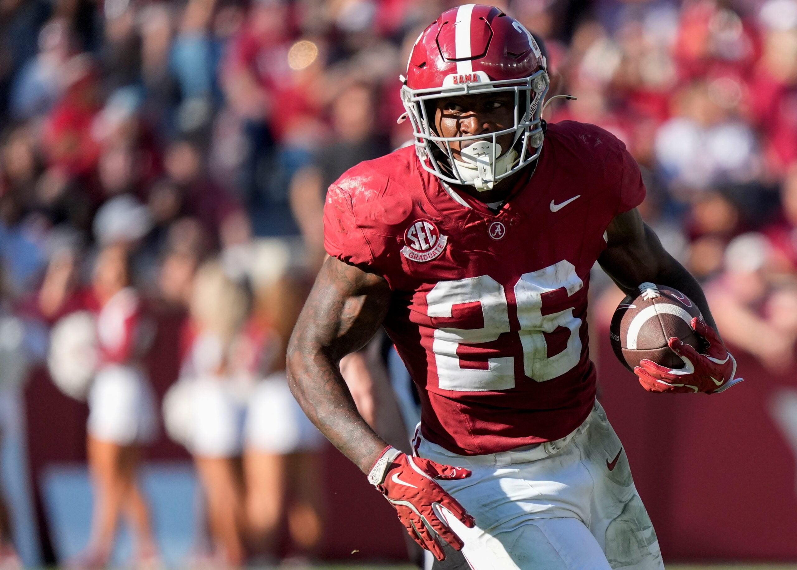 Nov 22, 2025; Tuscaloosa, Alabama, USA; Alabama running back Jam Miller (26) runs the ball against Eastern Illinois at Saban Field at Bryant-Denny Stadium.