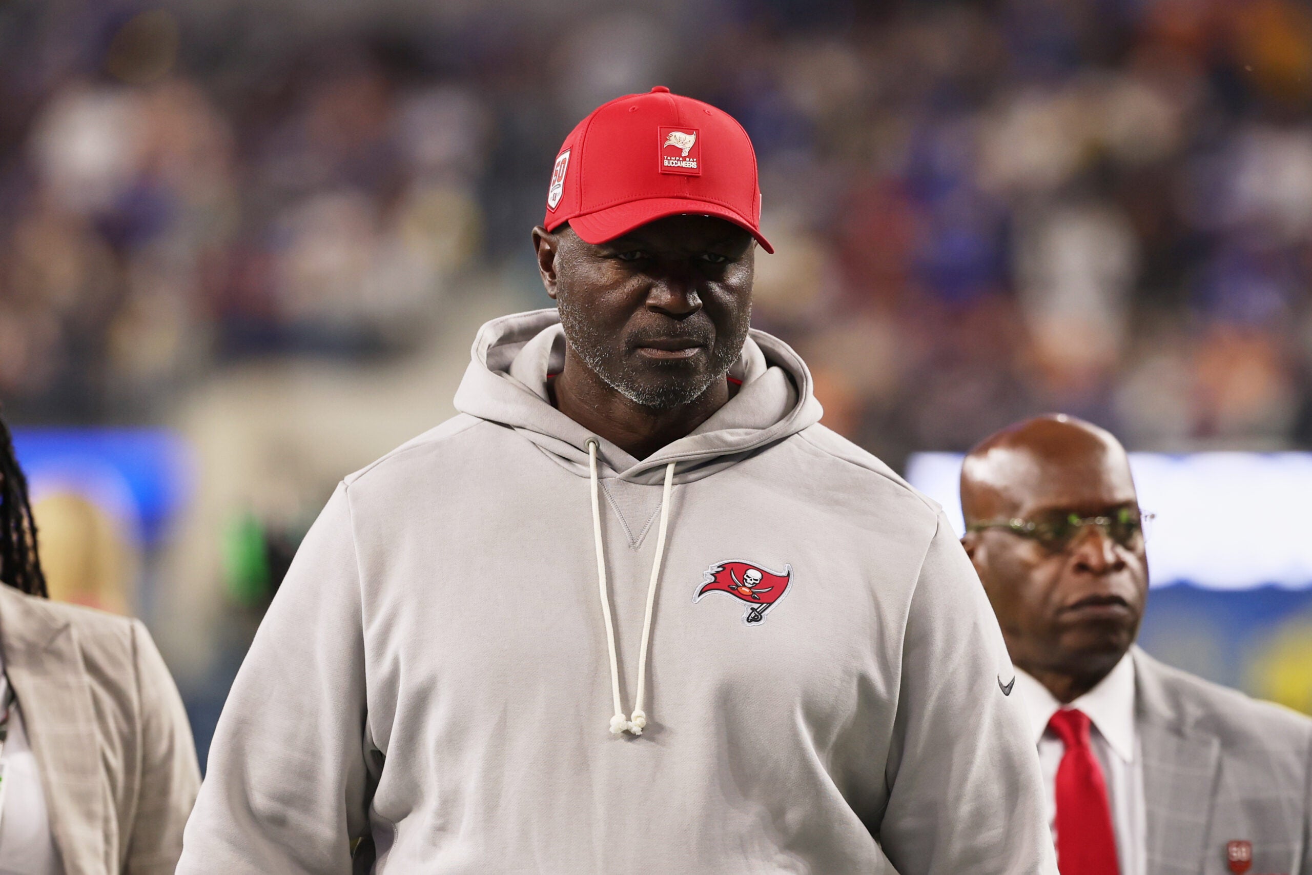 Nov 23, 2025; Inglewood, California, USA; Tampa Bay Buccaneers head coach and defensive coordinator Todd Bowles walks off the field during halftime against the Los Angeles Rams at SoFi Stadium.