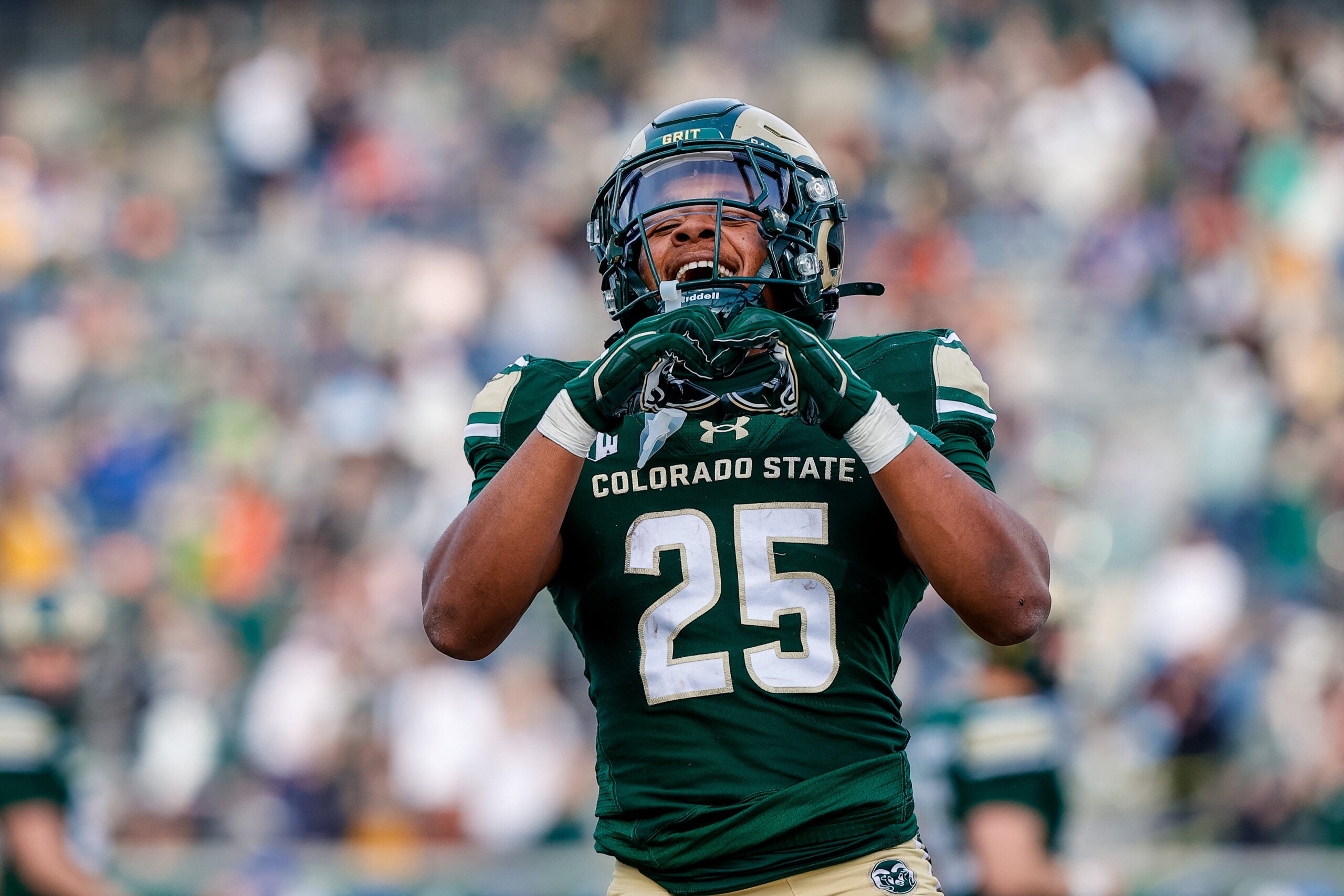 Nov 28, 2025; Fort Collins, Colorado, USA; Colorado State Rams running back Lloyd Avant (25) celebrates after his touchdown in the third quarter against the Air Force Falcons at Sonny Lubick Field at Canvas Stadium.