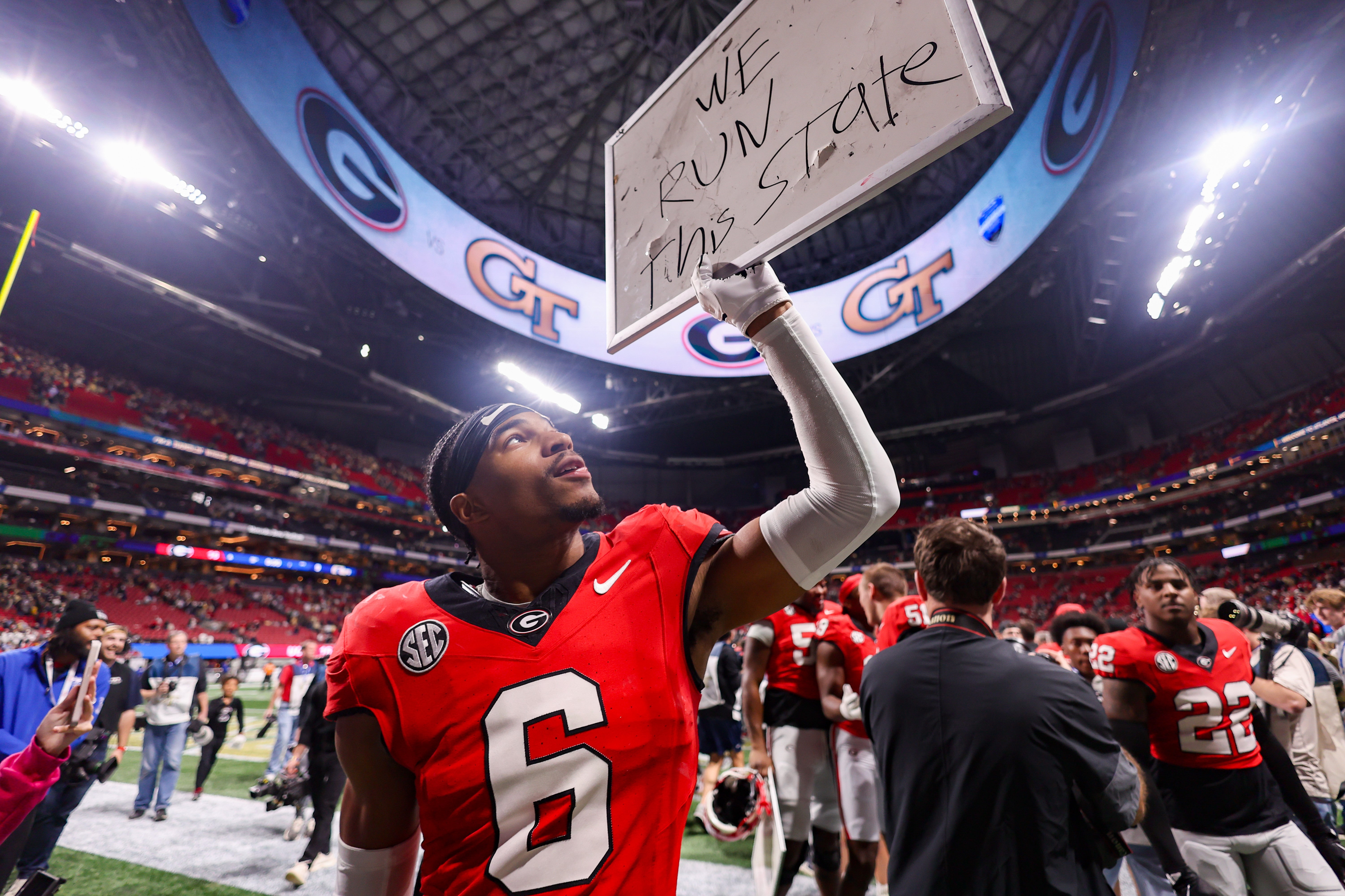 Nov 28, 2025; Atlanta, Georgia, USA; Georgia Bulldogs defensive back Daylen Everette (6) celebrates after a victory over the Georgia Tech Yellow Jackets at Mercedes-Benz Stadium.