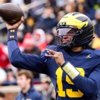 Michigan quarterback Bryce Underwood (19) warms up at Michigan Stadium in Ann Arbor on Saturday, Nov. 29, 2025.