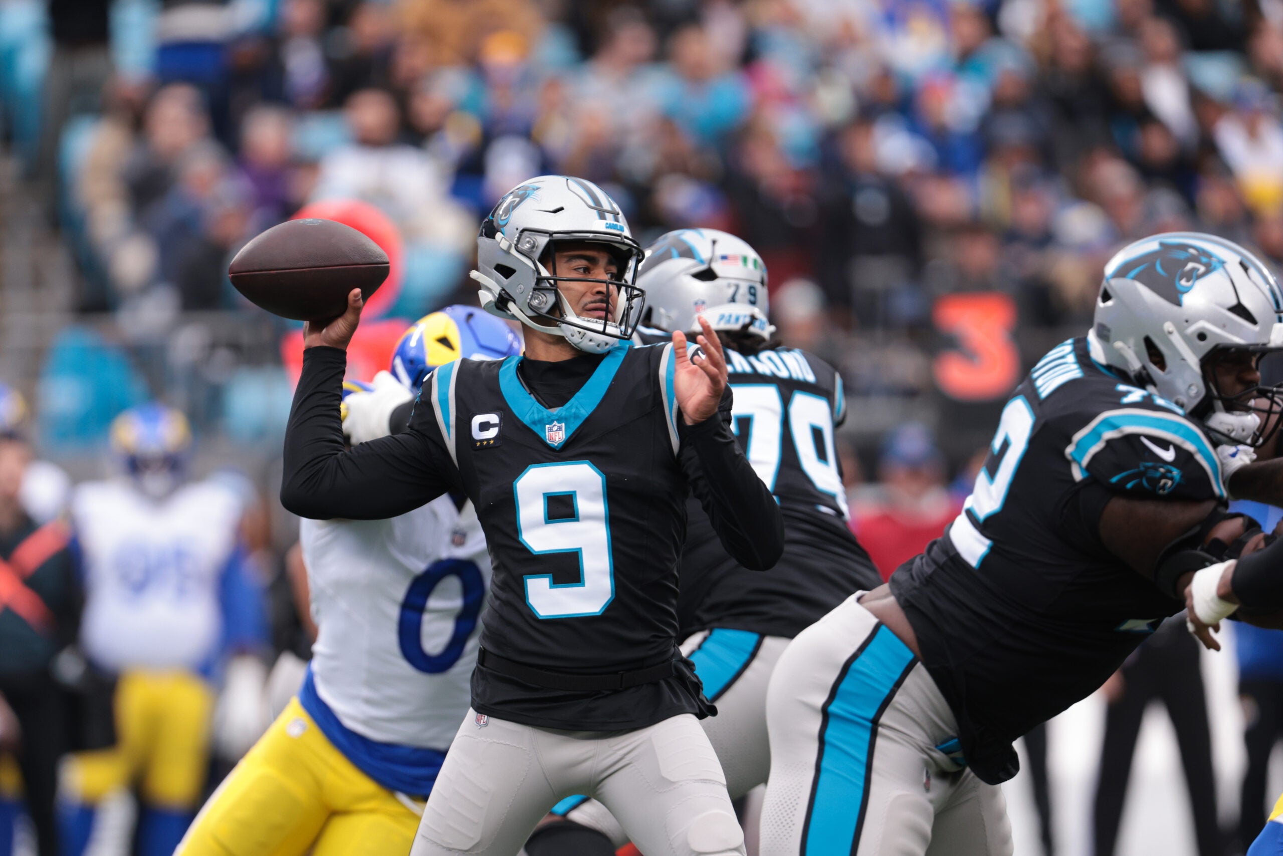 Nov 30, 2025; Charlotte, North Carolina, USA; Carolina Panthers quarterback Bryce Young (9) throws a pass during the first quarter against the Los Angeles Rams at Bank of America Stadium.