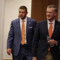 New UF head football coach Jon Sumrall, left, and UF Athletic Director Scott Stricklin arrives at the James W. “Bill” Heavener Football Training Center in Gainesville, FL on Monday, December 1, 2025.